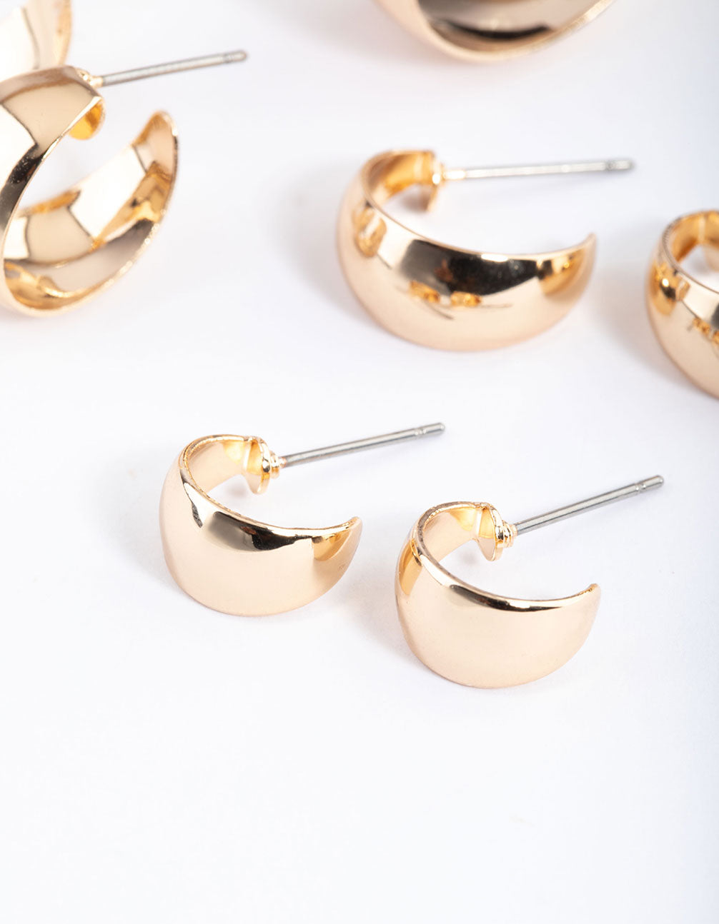 Set of Four Gold Basic Flat Hoop Earrings for Various Occasions