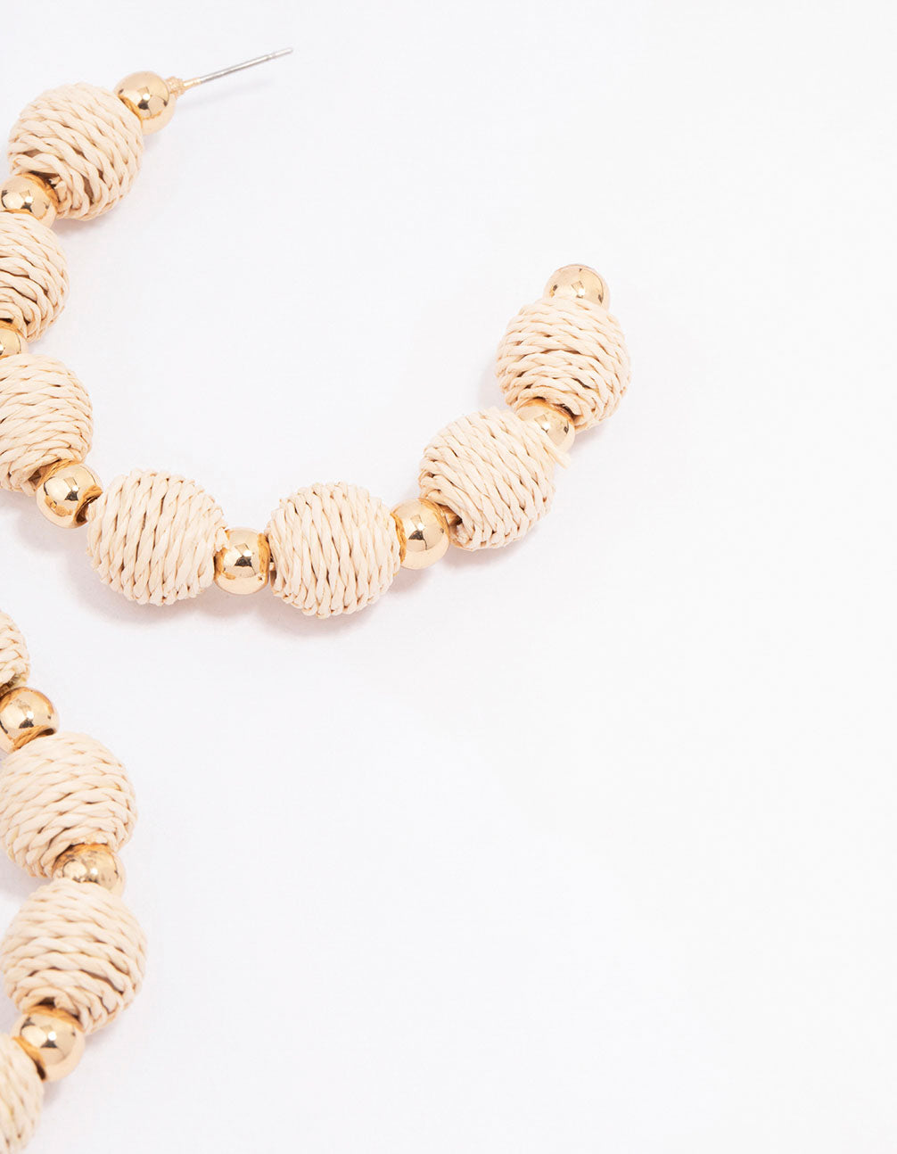 Large Gold-Toned Hoop Earrings Decorated with Raffia Balls